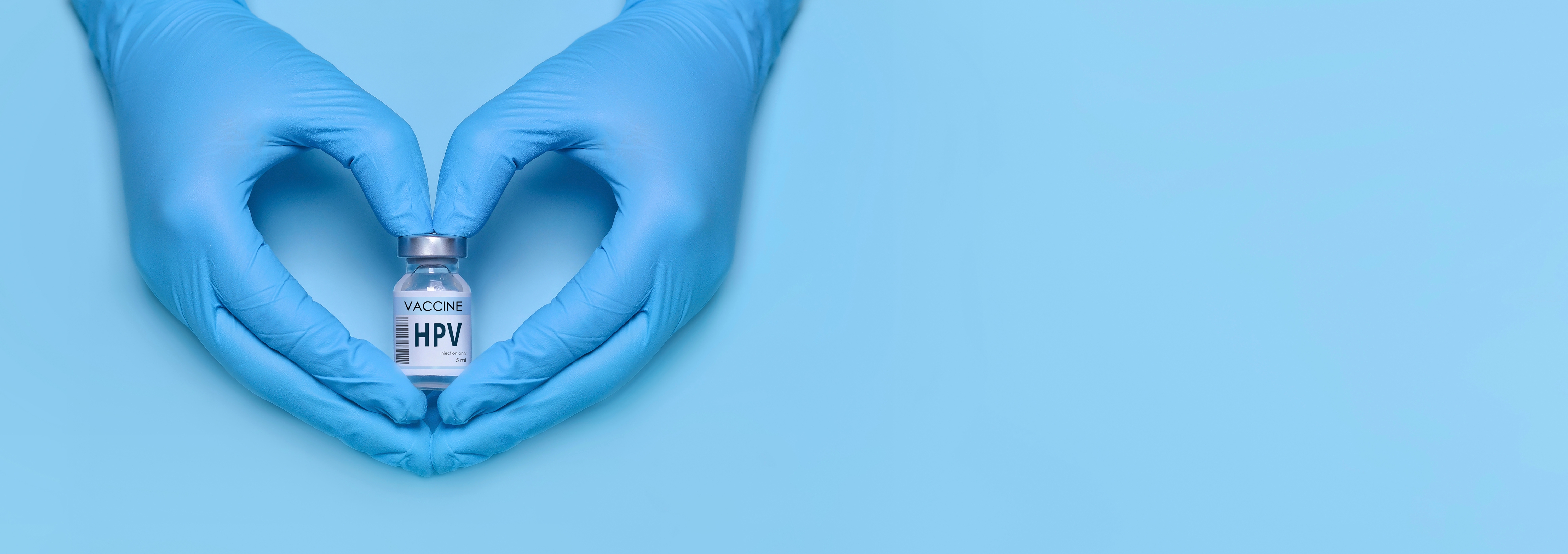 Doctor's,Hands,In,Protective,Medical,Gloves,Hold,A,Bottle,Of